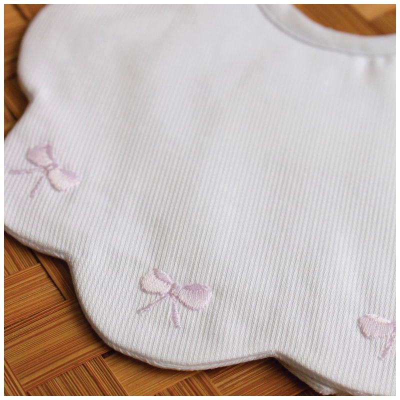 Embroidered bib in pure cotton by...