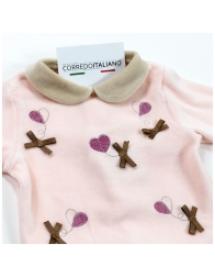 Soft and warm detail of corduroy romper for newborn girl