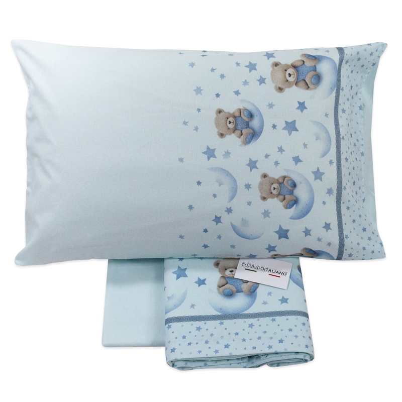 Flannel crib sheet for baby with bear sitting on crescent moon