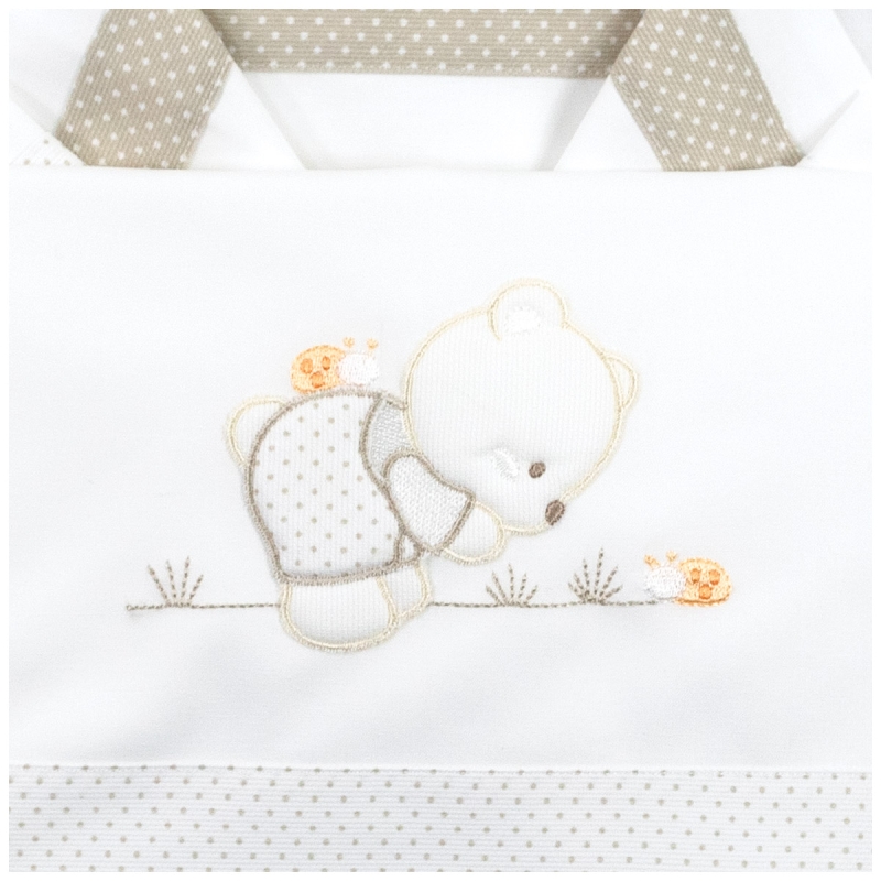 Detail of La Fatina cradle and pram sheet set with polka dot trim