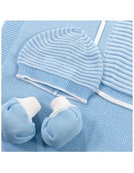 Detail of knitted newborn first outing layette set with teddy embroidery