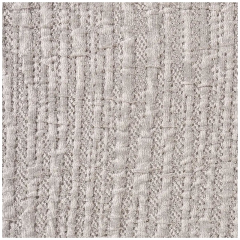 Close-up of jacquard relief weave on Caleffi Paraggi cotton bedspread
