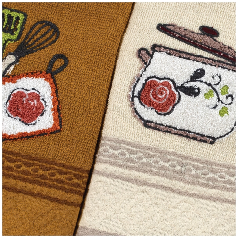Embroidered cotton dish towels placed on kitchen table