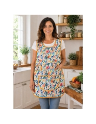 Apron worn in home kitchen while cooking coordinated kitchen textile setting