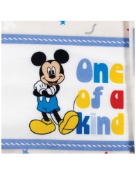 Dettaglio stampa Topolino su tessuto crema in fibra naturale per neonati Disney Baby