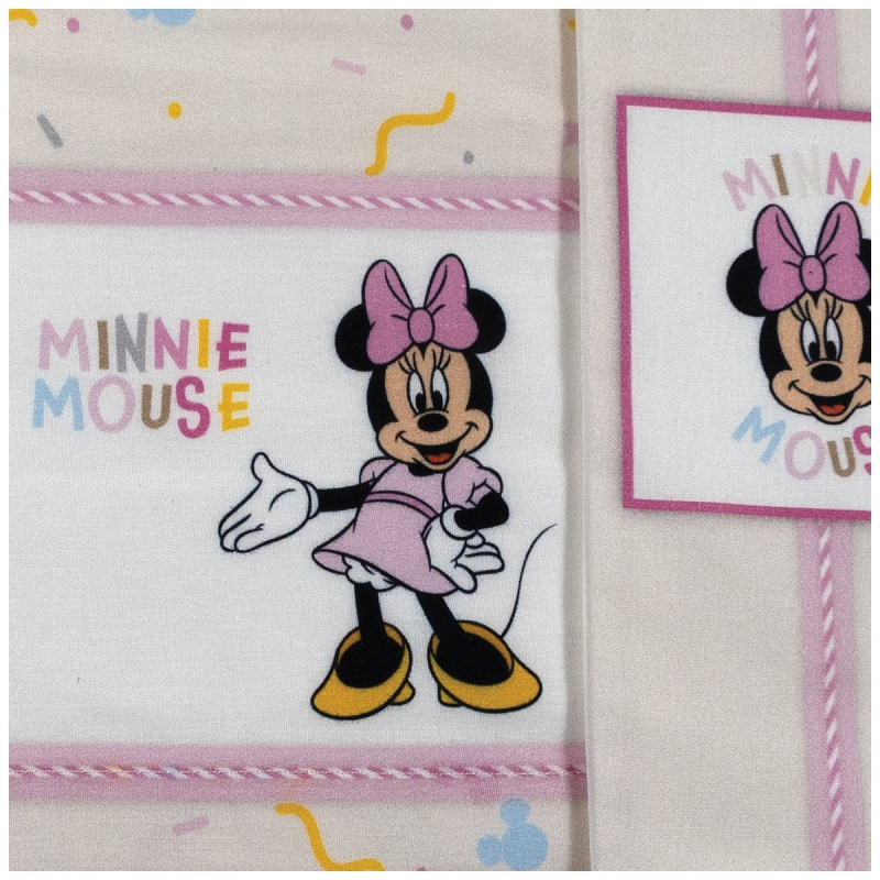 dettaglio stampa Minnie Mouse su tessuto in cotone con motivo colorato e finitura liscia