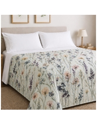 Copriletto matrimoniale Aqua in cotone piquet con stampa floreale su letto moderno