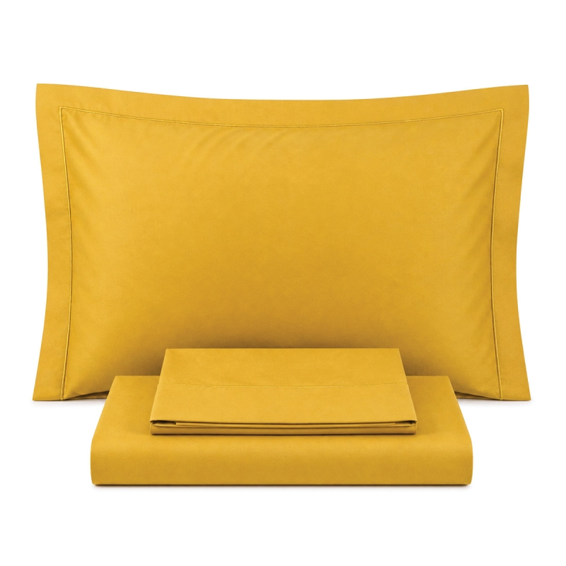 Cotton percale double bed sheet set with piping displayed on double size bed