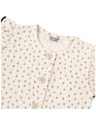 Button detail with floral romper