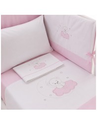 Detail of teddy bear on a pink cloud embroidery on pure cotton baby sheet and duvet cover.