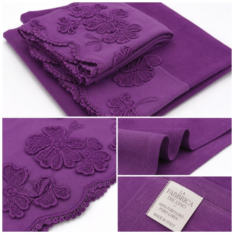 Close-up of floral appliqués on Italian crinkled linen bathroom towel
