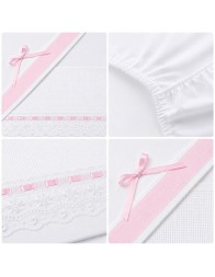 Close-up of embroidered lace and pink ribbon detail on baby cradle and pram sheet set made in Italy
