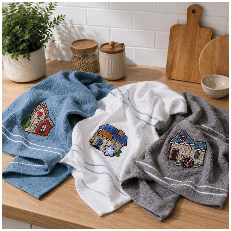 Embroidered cotton kitchen towels on modern countertop
