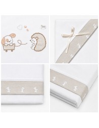 White cotton baby cot sheet set with beige inserts and satin bow