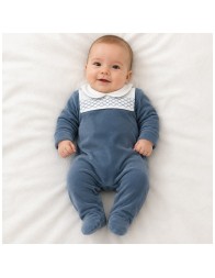 Baby romper in powder blue chenille with integrated feet and long sleeves
