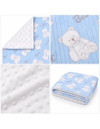 Double-sided baby crib blanket in soft pile with reversible corner