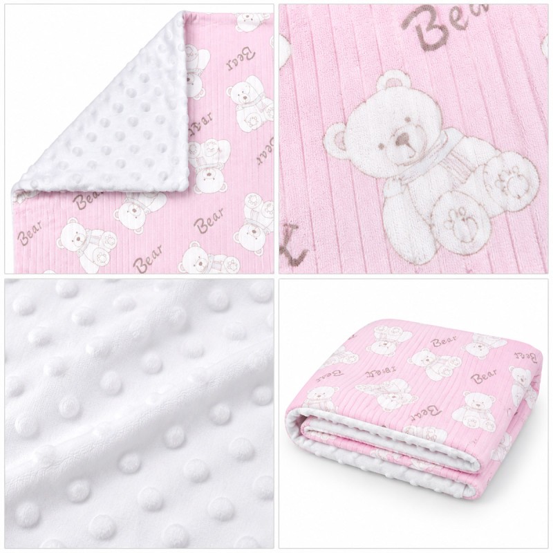 Double-sided baby crib blanket in soft pile with reversible corner