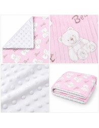 Double-sided baby crib blanket in soft pile with reversible corner