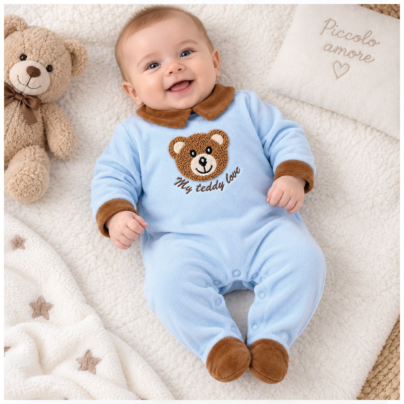 Baby velour sleepsuit in light blue worn by a 3-month-old baby, with integrated feet