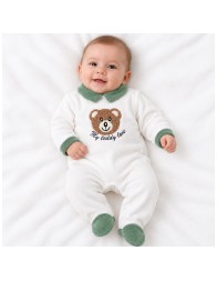 White chenille baby romper with integrated feet worn by a baby