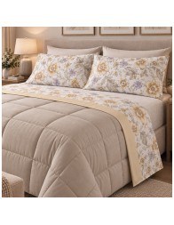 Ilda Gabel double bed flannel sheet set with floral pattern on a light background, photographed from above