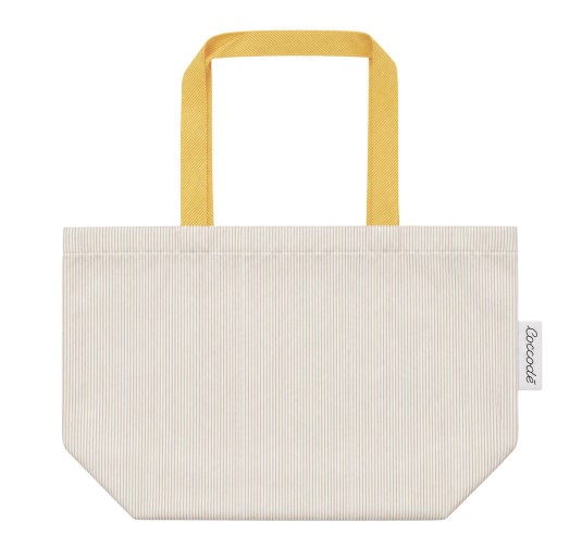Coccode' Firenze girls' laundry bag in ivory fabric with yellow handles and a spacious bag shape