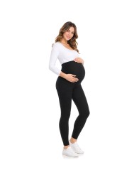 Leggings premaman neri in cotone elasticizzato indossati da modella