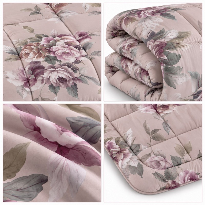 Close-up of the quilted panels and floral pattern on the double bed quilt