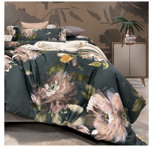 Double bed styled with Francine Dondi Home bedding, floral motif and matching plain fitted sheet