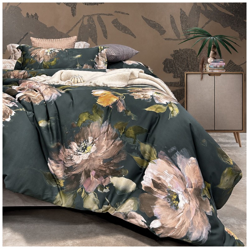 Double bed styled with Francine Dondi Home bedding, floral motif and matching plain fitted sheet